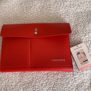 Woman’s Red clutch purse organizer